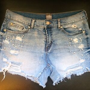 Blue jean shorts with pearl designs